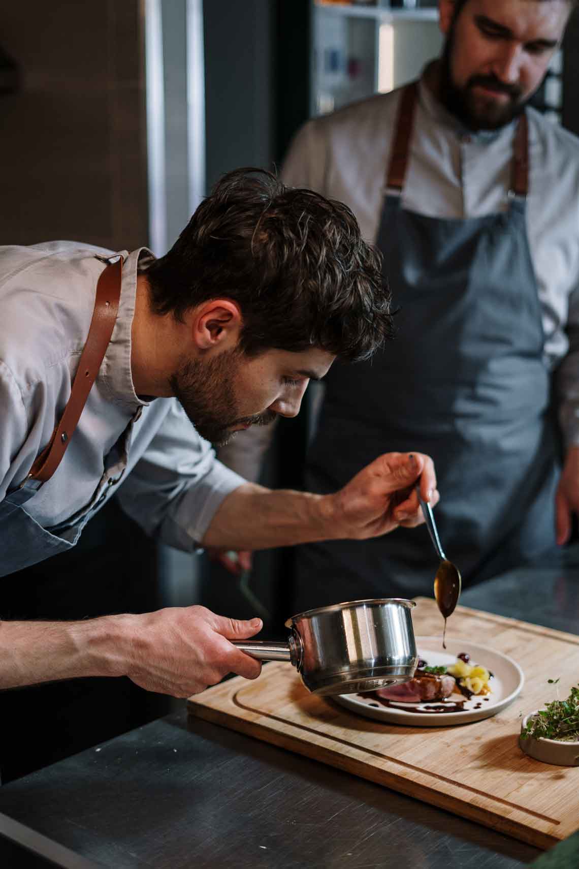 Chef plating a dish