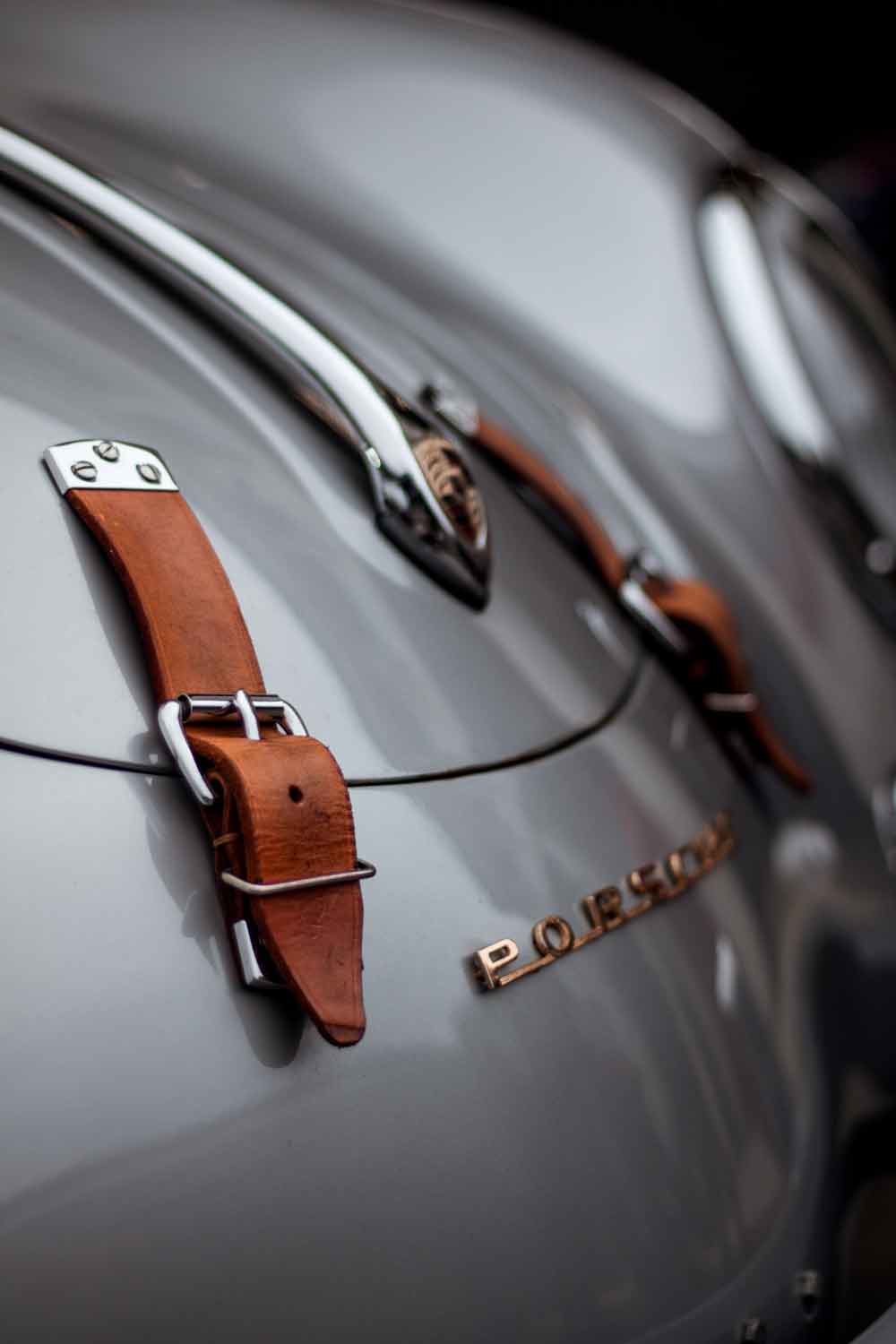 Porsche with leather staps on bonnet